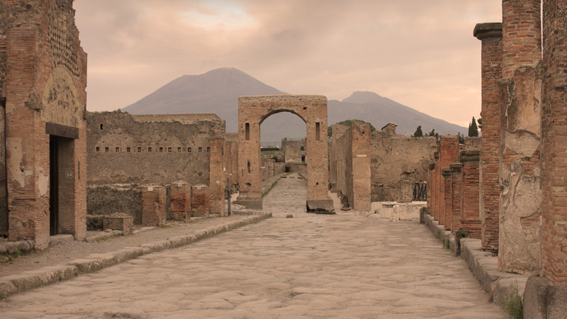 The streets of Pompeii with Vesuvius in the background